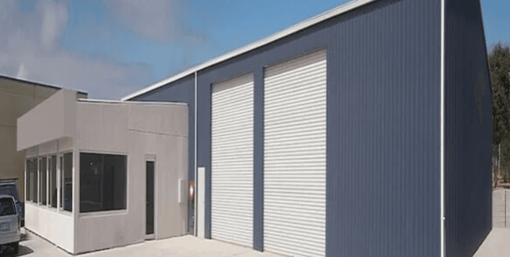 Large industrial steel shed for warehousing and heavy vehicle access